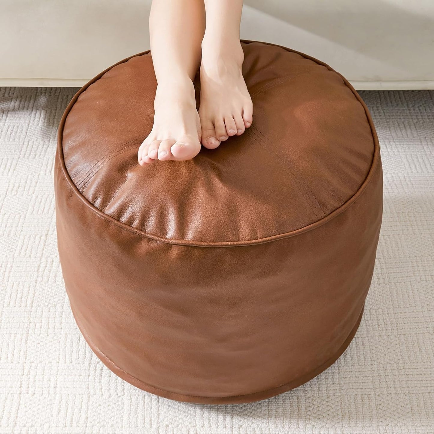 HIGOGOGO Round Stuffed Pouf Ottoman, Pu Leather Poufs with Foam Chunk Filling Foot Stool Storage Ottoman, 26 X 18 Floor Poufs Foot Rest for Living Room, Brown