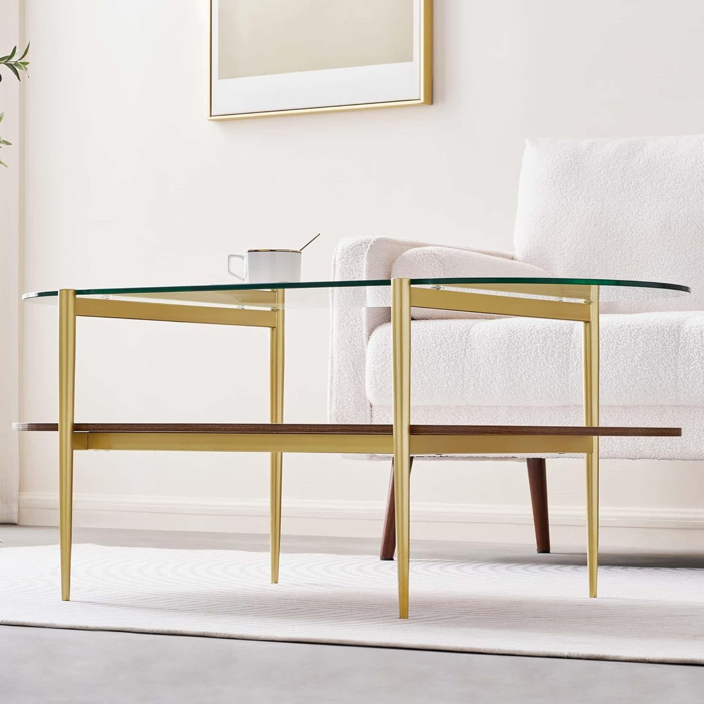 Oval Glass Coffee Table, Mid-Century Modern Design, L41 x W21 x H17 inch, for Living Room, 2-Tier Structure, Clear Glass Top and Walnut Finish Wood Shelf, Conical Legs with Gold Finish Frame