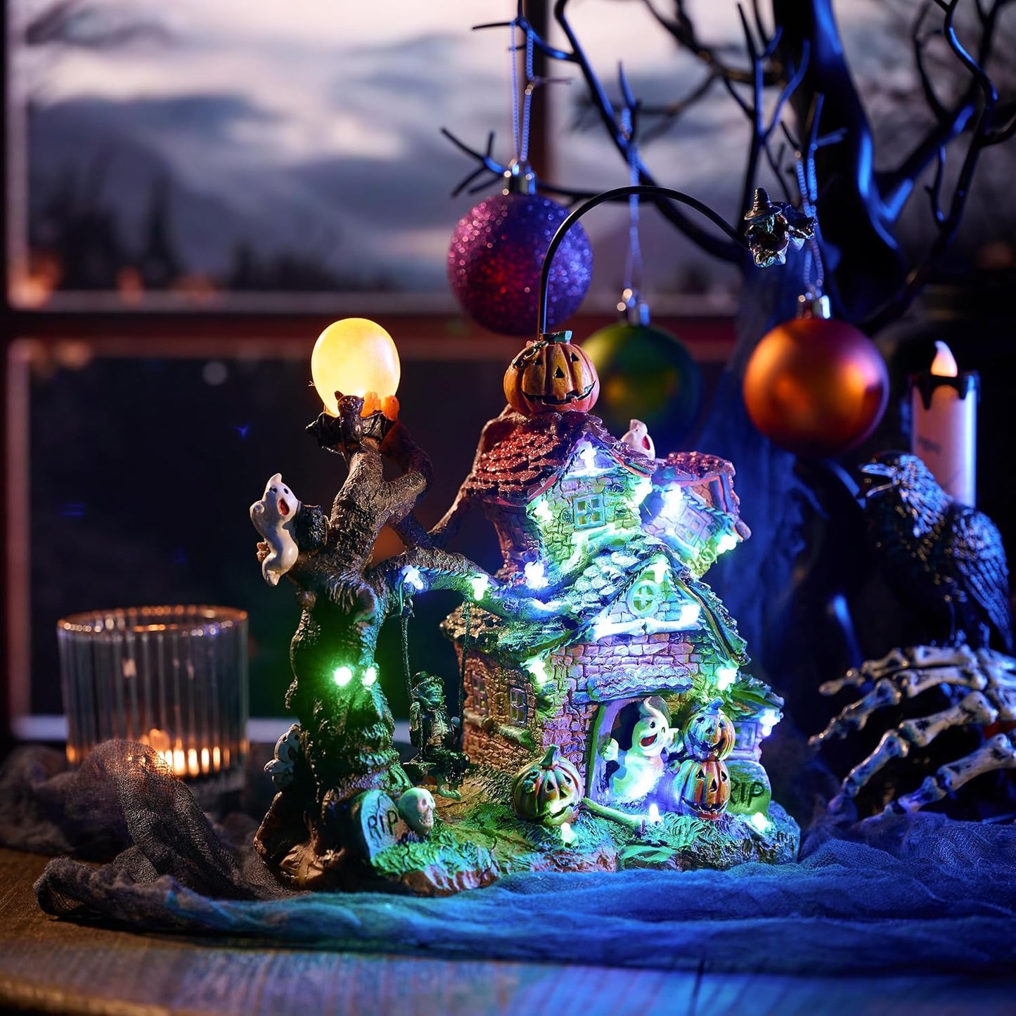 Valery Madelyn Halloween Decorations, Lighted Halloween Village Houses with Music and LED Lights, Resin Spooky Town Flying Witch and Haunted House for Home and Party Table Desk Mantel, 12 Inch