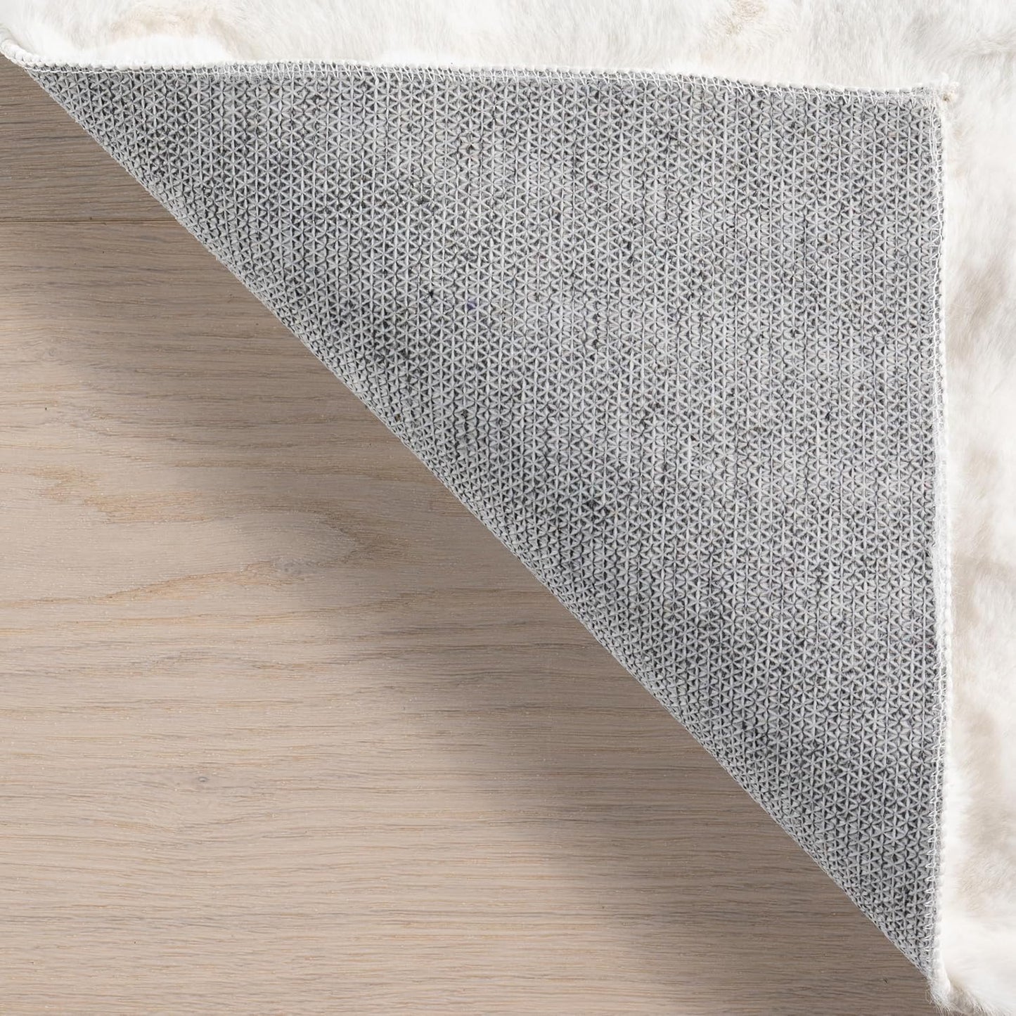 nuLOOM Jeni Solid Faux Rabbit Machine Washable Runner Rug, 2' 6" x 10', Off-White